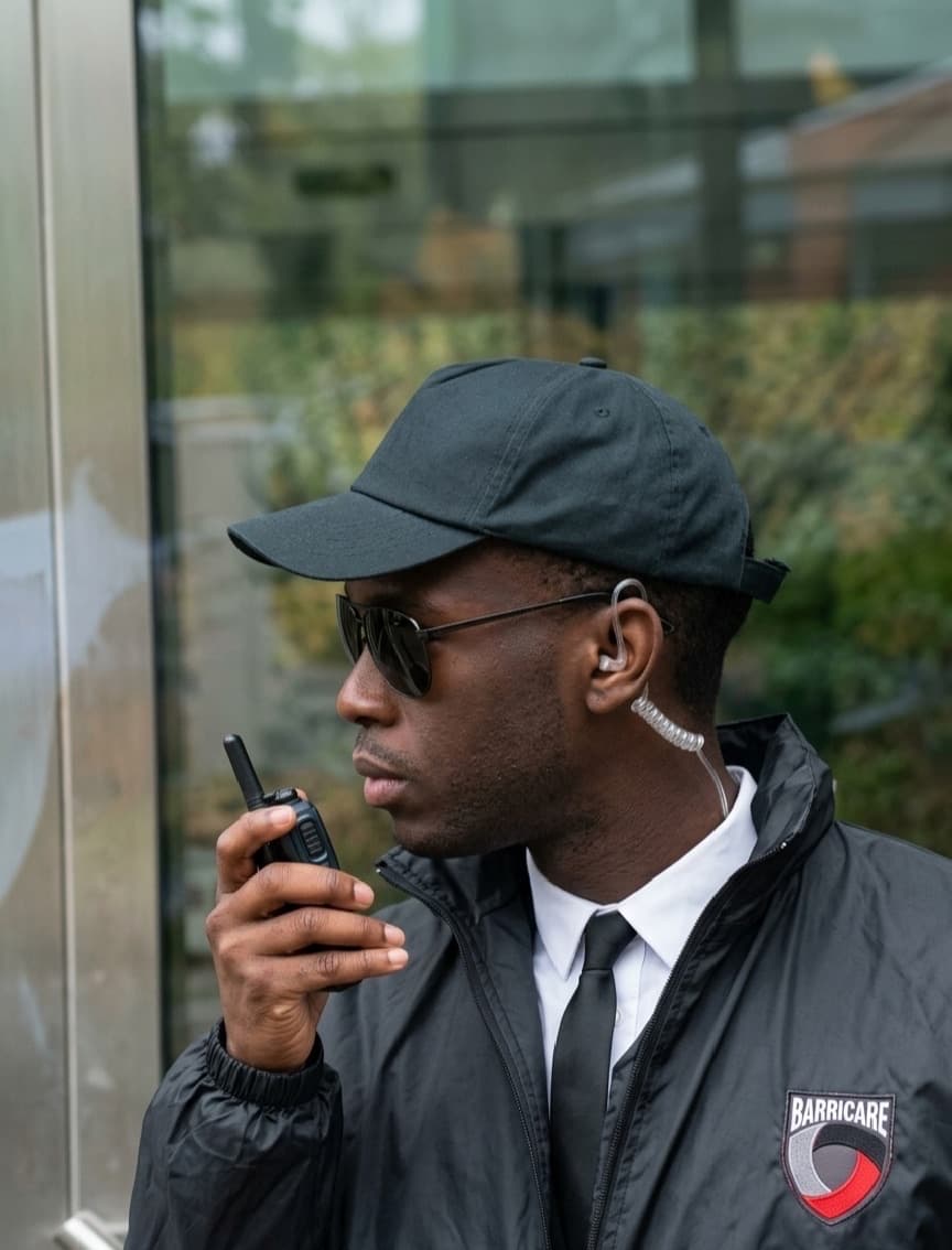 Security officer communicating by radio